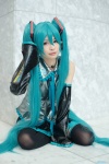 aqua_hair cosplay detached_sleeves hatsune_miku headset pleated_skirt skirt thighhighs tie twintails uta vocaloid rating:Safe score:1 user:pixymisa