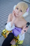 blonde_hair colorful_x_melody_(vocaloid) cosplay detached_sleeves dress ear_muffs kagamine_rin makoko microphone project_diva thighhighs vocaloid zettai_ryouiki rating:Safe score:1 user:nil!