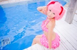 bikini_top cosplay hair_ribbons kaname_madoka mashiro_yuki miniskirt pink_hair pool puella_magi_madoka_magica skirt swimsuit twintails wet rating:Safe score:0 user:nil!