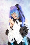 anti_the_infinite_holic_(vocaloid) blue_hair cosplay detached_sleeves dress hair_ribbons hatsune_miku headset kudan_yu tie twintails vocaloid rating:Safe score:0 user:pixymisa