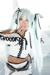 cosplay detached_sleeves hair_ribbons halter_top hatsune_miku minase_aki miniskirt project_diva skirt twintails vocaloid voice_(vocaloid) white_hair rating:Safe score:0 user:pixymisa