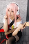 black_legwear cosplay guitar harumiya_yun headphones jumper nitro_super_sonic pantyhose pink_hair sheer_legwear super_soniko thighhighs tshirt zettai_ryouiki rating:Safe score:0 user:pixymisa