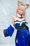 animal_ears caster cosplay detached_sleeves dress fate/extra fate/series fox_ears pink_hair seri thighhighs rating:Safe score:0 user:pixymisa