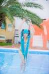 aqua_hair bikini cleavage cosplay hatsune_miku headset mashiro_yuki pool project_diva swimsuit twintails vocaloid wet rating:Safe score:0 user:nil!