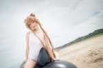 animal_ears beach cosplay horo inflatable_toy ocean one-piece_swimsuit orange_hair rococo spice_and_wolf swimsuit whistle_around_the_world wolf_ears rating:Safe score:2 user:nil!