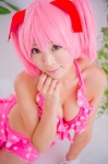 bikini_top cleavage cosplay hair_ribbons kaname_madoka mashiro_yuki miniskirt pink_hair puella_magi_madoka_magica skirt swimsuit twintails rating:Safe score:2 user:nil!