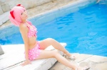 bikini_top cosplay hair_ribbons kaname_madoka mashiro_yuki miniskirt pink_hair pool puella_magi_madoka_magica skirt swimsuit twintails rating:Safe score:0 user:nil!