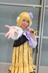 azumi_(iii) bow cosplay detached_sleeves dress ear_muffs flower grey_eyes kagamine_rin microphone vocaloid yellow_hair rating:Safe score:0 user:pixymisa