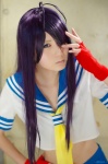 ahoge aoi_mitsuki cosplay croptop fingerless_gloves gloves ikkitousen kanu_unchou pleated_skirt purple_hair sailor_uniform school_uniform skirt rating:Safe score:0 user:nil!