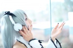 cosplay detached_sleeves halter_top hatsune_miku headset shuuto silver_hair twintails vocaloid voice_(vocaloid) rating:Safe score:1 user:pixymisa