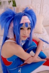 bed blue_hair bodysuit buyara cosplay hair_ribbons headband klan_klein macross macross_frontier twintails rating:Safe score:0 user:nil!