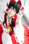 blouse cosplay detached_sleeves hairbow hakurei_reimu miko satori skirt touhou rating:Safe score:1 user:pixymisa