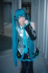 aqua_eyes aqua_hair blouse cosplay detached_sleeves haruka hatsune_miku headset pleated_skirt skirt thighhighs tie twintails vocaloid rating:Safe score:0 user:pixymisa