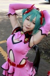 aqua_hair cosplay dress hairbows hatsune_miku higurashi_rin twintails vocaloid wings rating:Safe score:0 user:pixymisa