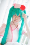 aqua_hair cosplay hatsune_miku nurse nurse_cap nurse_uniform plushie sannomiya twintails vocaloid rating:Safe score:0 user:pixymisa