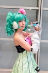 bow cosplay detached_sleeves dress ear_muffs flower green_eyes green_hair hatsune_miku microphone twintails vocaloid yunami rating:Safe score:0 user:pixymisa