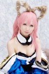 animal_ears caster cleavage cosplay detached_sleeves dress fate/extra fate/series fox_ears fox_tail pink_hair seri rating:Safe score:1 user:pixymisa