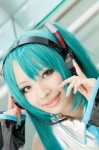 aqua_hair blouse cosplay detached_sleeves hatsune_miku headset nakko tie twintails vocaloid rating:Safe score:0 user:pixymisa