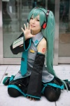 aqua_hair blouse cosplay detached_sleeves hatsune_miku headset maitako pleated_skirt skirt thighhighs tie twintails vocaloid rating:Safe score:0 user:nil!