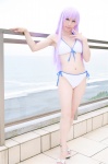 beach bikini cleavage cosplay crystal_crown feena_fam_earthlight kamui_arisa ocean purple_hair side-tie_bikini swimsuit yoake_mae_yori_ruri_iro_na rating:Safe score:1 user:nil!