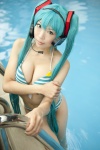 aqua_hair bikini cleavage cosplay hatsune_miku headset mashiro_yuki pool project_diva swimsuit twintails vocaloid wet rating:Safe score:9 user:nil!
