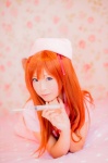 bed cosplay dress mashiro_yuki neon_genesis_evangelion nurse nurse_cap nurse_uniform red_hair soryu_asuka_langley stethoscope syringe twintails rating:Safe score:0 user:nil!