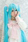 aqua_hair bow cosplay dress hatsune_miku lots_of_laugh_(vocaloid) rushi twintails vocaloid rating:Safe score:0 user:pixymisa