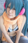 bikini blue_hair cleavage cosplay ear_muffs hatsune_miku headset jeans momoka_(ii) open_clothes scarf swimsuit twintails vocaloid rating:Safe score:1 user:nil!