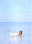 beach bikini cleavage dog ocean peek_a_boo sato_hiroko swimsuit wet rating:Safe score:0 user:nil!