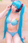 aqua_hair bikini cleavage cosplay hatsune_miku headset mashiro_yuki project_diva swimsuit twintails vocaloid rating:Safe score:1 user:nil!