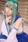 choker cosplay detached_sleeves green_hair hairband kochiya_sanae miniskirt sailor_uniform school_uniform skirt touhou wand yuku rating:Safe score:1 user:nil!