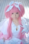 boots cosplay dress gloves hairbows kaname_madoka mumuko petticoat pink_eyes pink_hair puella_magi_madoka_magica shawl tiered_skirt twintails wings rating:Safe score:1 user:pixymisa