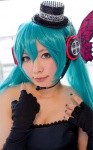 aqua_hair cleavage cosplay dress elbow_gloves fingerless_gloves gloves hatsune_miku headset strapless top_hat twintails vocaloid yane rating:Safe score:0 user:pixymisa