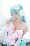 aqua_hair cleavage cosplay detached_sleeves dress hatsune_miku microphone tagme_song twintails uni vocaloid rating:Safe score:0 user:nil!
