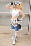 blonde_hair blue_mary chaps cosplay gloves halter_top king_of_fighters midriff nogu pantyhose twintails rating:Safe score:3 user:nil!
