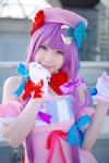 amatsuka_miyu bows bowtie cosplay dress gloves hairbows hat patchouli_knowledge purple_eyes purple_hair touhou twintails rating:Safe score:0 user:pixymisa