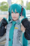 aqua_hair blouse cosplay detached_sleeves hatsune_miku headset tie twintails vocaloid yoriyori rating:Safe score:0 user:nil!