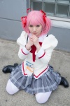 blouse bowtie cosplay hair_ribbons kaname_madoka kawabe_yuki pink_eyes pink_hair pleated_skirt puella_magi_madoka_magica skirt thighhighs twintails rating:Safe score:0 user:pixymisa