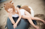 animal_ears beach cosplay horo inflatable_toy ocean one-piece_swimsuit orange_hair rococo spice_and_wolf swimsuit tail whistle_around_the_world wolf_ears rating:Safe score:3 user:nil!