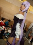 beltbra cosplay dizzy guilty_gear hairbows onihara_akira open_dress purple_hair thighhighs rating:Safe score:0 user:nil!