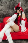 boots cosplay detached_sleeves hairbow hakurei_reimu kneepads lenfried miko one-piece_swimsuit swimsuit thighhighs touhou rating:Safe score:1 user:nil!