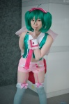 collar cosplay cuffs garter_straps green_hair hairbow macross macross_frontier miki ranka_lee red_eyes shorts thighhighs tie twintails vest rating:Safe score:2 user:pixymisa