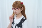 cosplay glasses hair_pods kanda_midori neon_genesis_evangelion red_hair soryu_asuka_langley tshirt twintails rating:Safe score:1 user:nil!