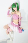 ahoge armband boots cosplay detached_sleeves green_hair hair_ribbons macross macross_frontier mashiro_yuki microphone miniskirt ranka_lee skirt tubetop twintails rating:Safe score:5 user:nil!