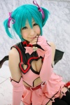 aqua_hair chii cleavage cosplay dress elbow_gloves fingerless_gloves gloves hairbows hatsune_miku project_diva stirrup_socks tail twintails vocaloid world_is_mine_(vocaloid) rating:Safe score:0 user:nil!