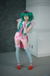 collar cosplay cuffs garter_straps green_hair hairbow macross macross_frontier miki ranka_lee red_eyes shorts thighhighs tie twintails vest rating:Safe score:1 user:pixymisa