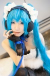 blue_hair bodice cosplay fingerless_gloves gloves hairband hatsune_miku headphones ribbon_tie skirt tatsuki_(ii) thighhighs twintails vocaloid rating:Safe score:2 user:pixymisa