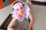 apron arai_yomi cosplay headphones nearly_naked_apron nitro_super_sonic panties pink_hair soniko_nuija_imashita super_soniko rating:Safe score:0 user:nil!