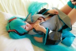 aqua_hair arai_yomi bed blouse bra cosplay detached_sleeves hatsune_miku headset open_clothes panties pleated_skirt skirt thighhighs tie twintails vocaloid rating:Safe score:2 user:nil!