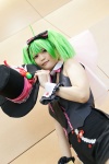 beni collar cosplay cuffs green_hair hairbow macross macross_frontier ranka_lee red_eyes shorts tie top_hat twintails vest rating:Safe score:0 user:pixymisa